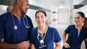 Healthcare workers wearing sustainable work clothes