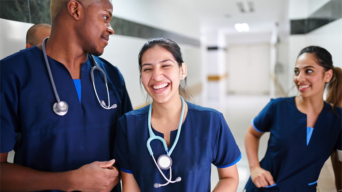 Healthcare workers wearing sustainable work clothes