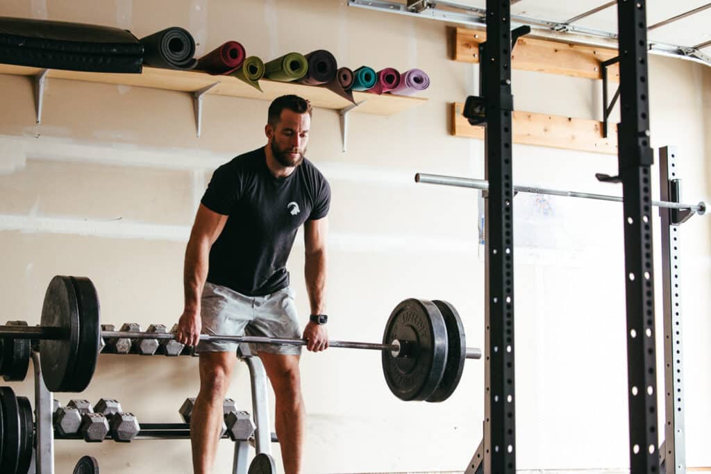 man lifting weights